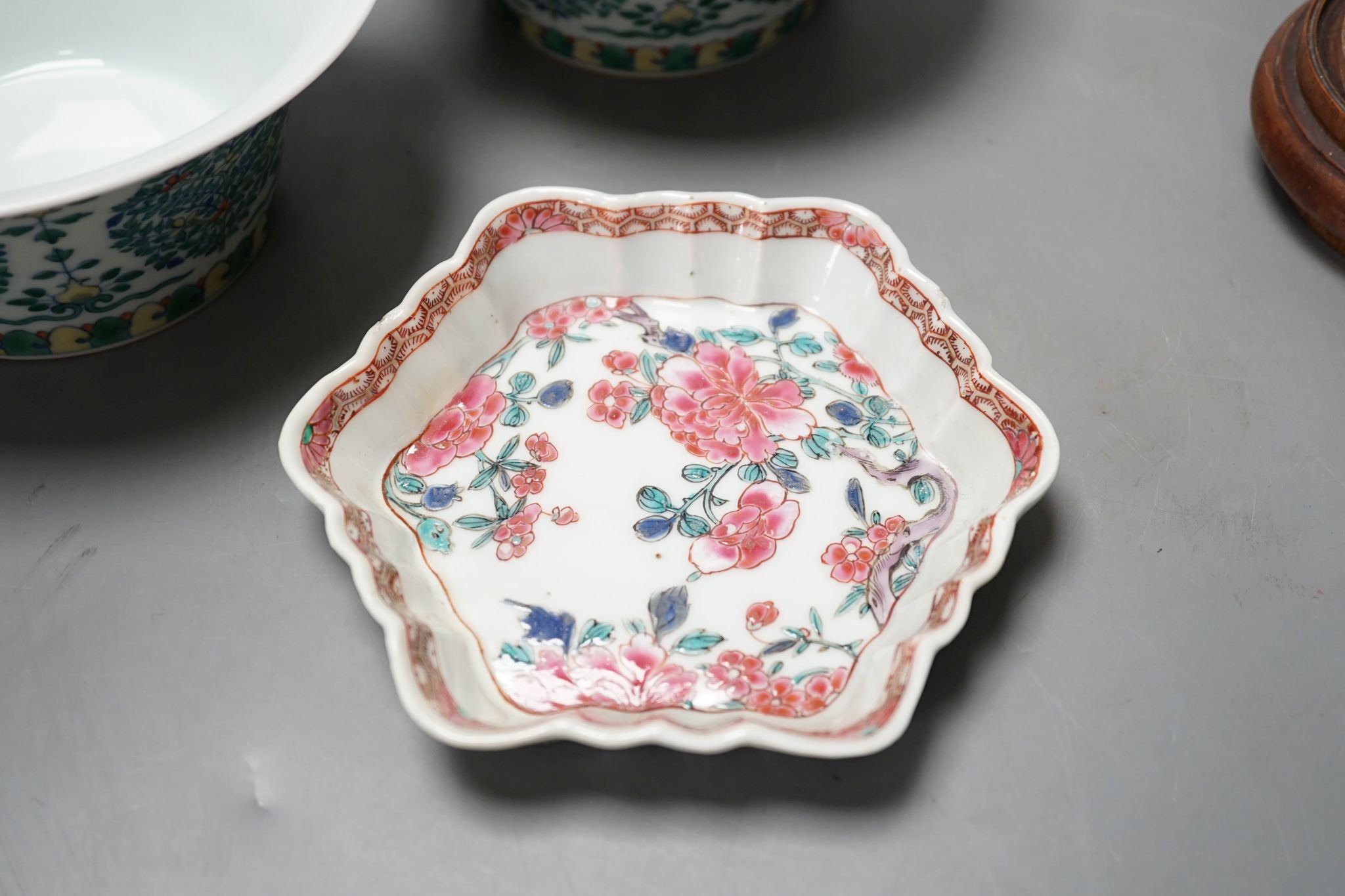 A Chinese blue and white bowl, Kangxi, 15cm. diam., a famille rose teapot stand, Yongzheng, and two doucai bowls